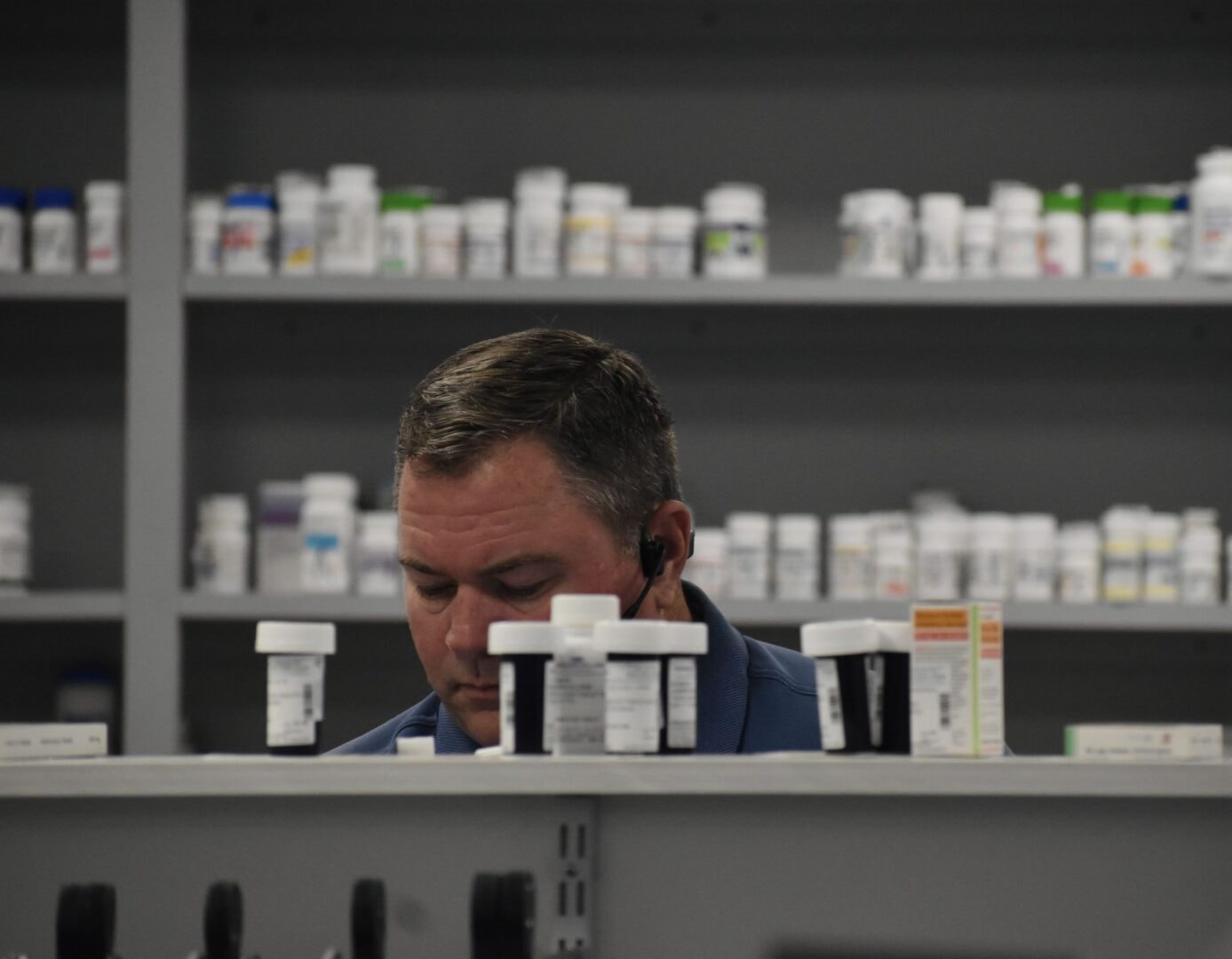 Pharmacist helping a customer